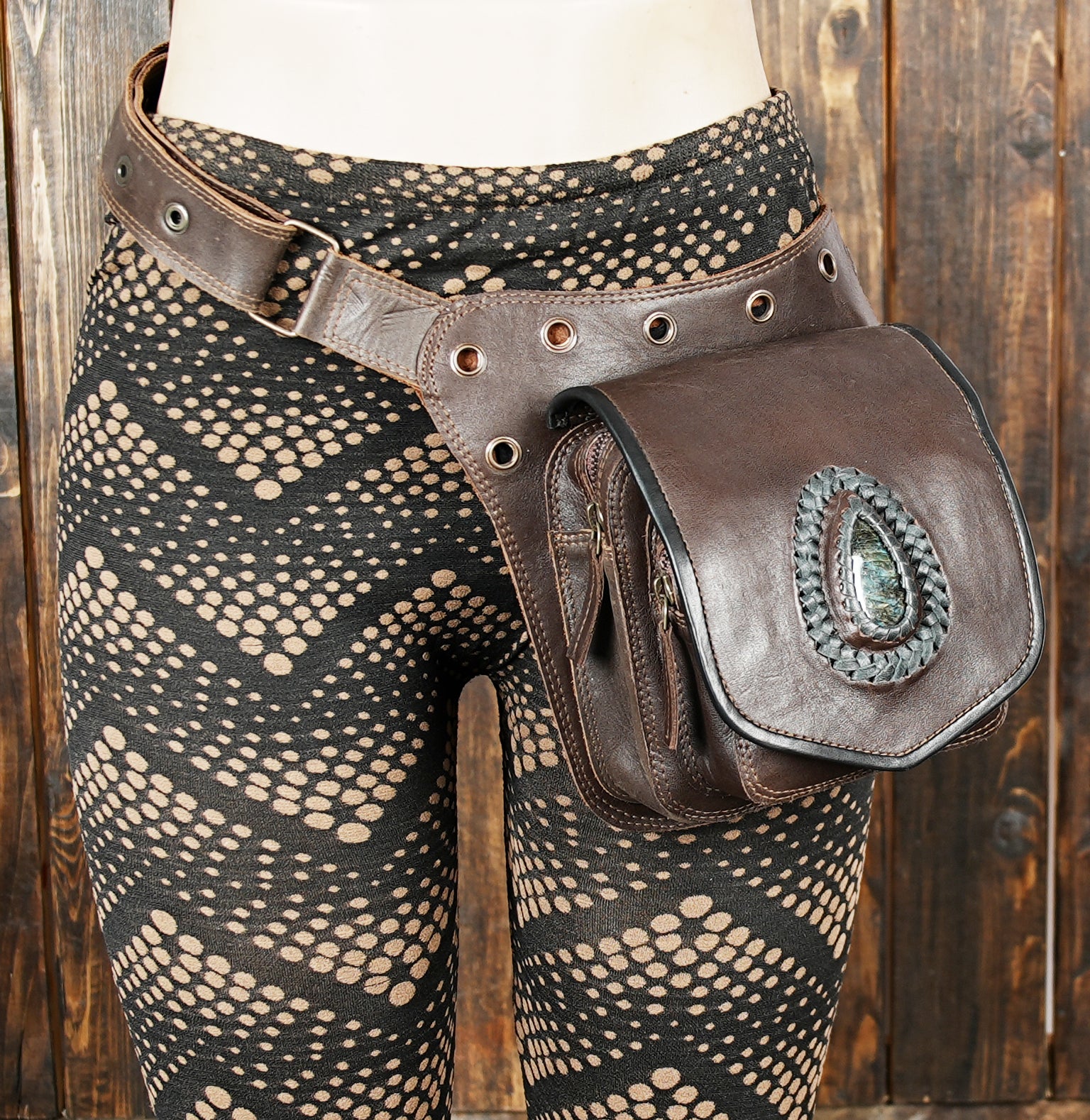 Steampunk-inspired leather waist bag with stone detail