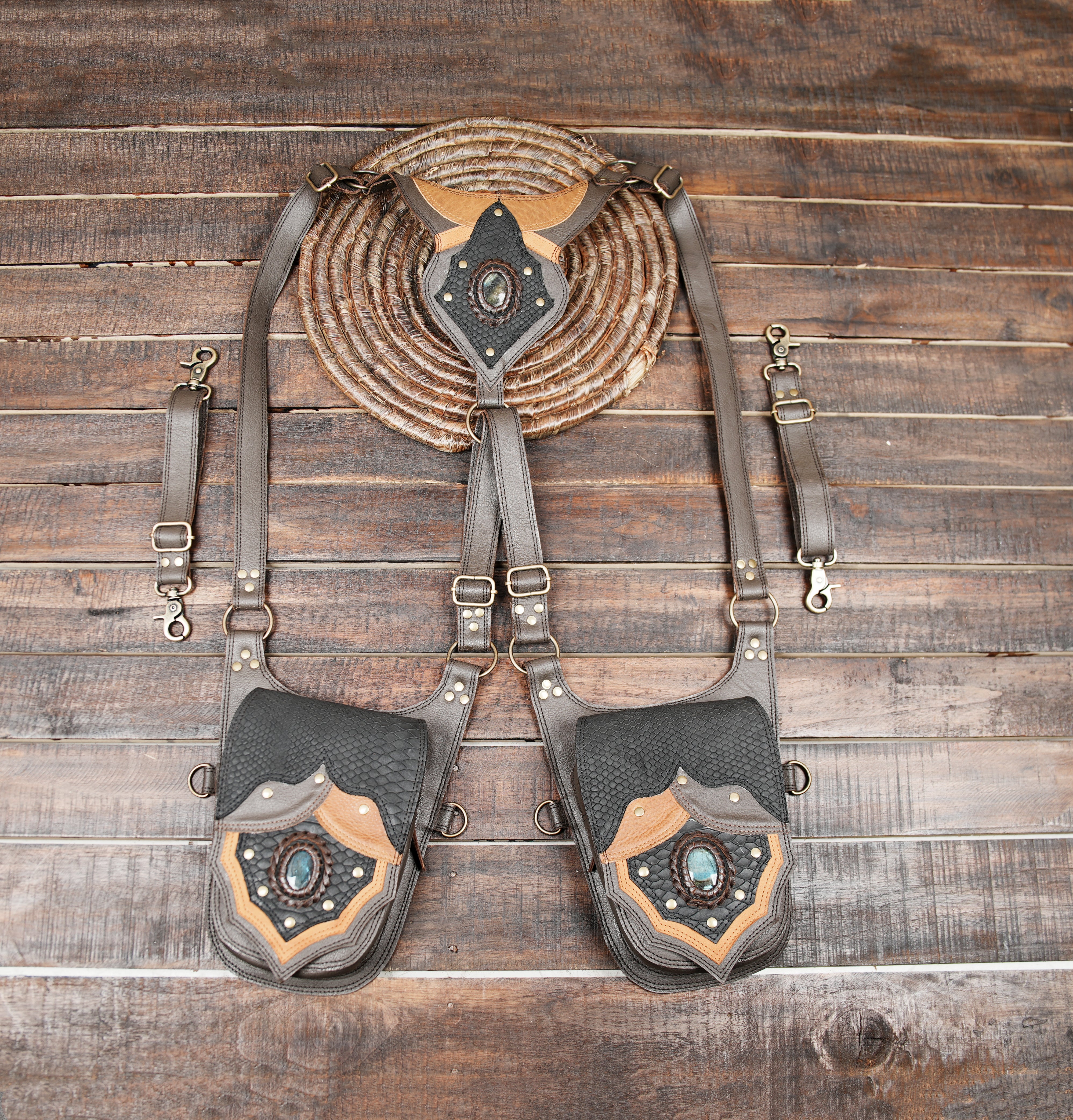 brown leather holster harness bag with central stone accent