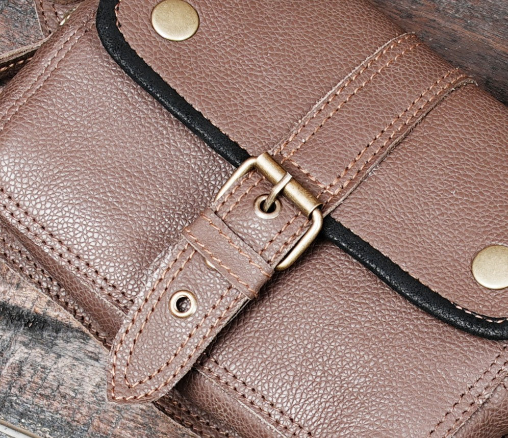 Women’s side view wearing vintage brown leather waist belt bag over patterned leggings