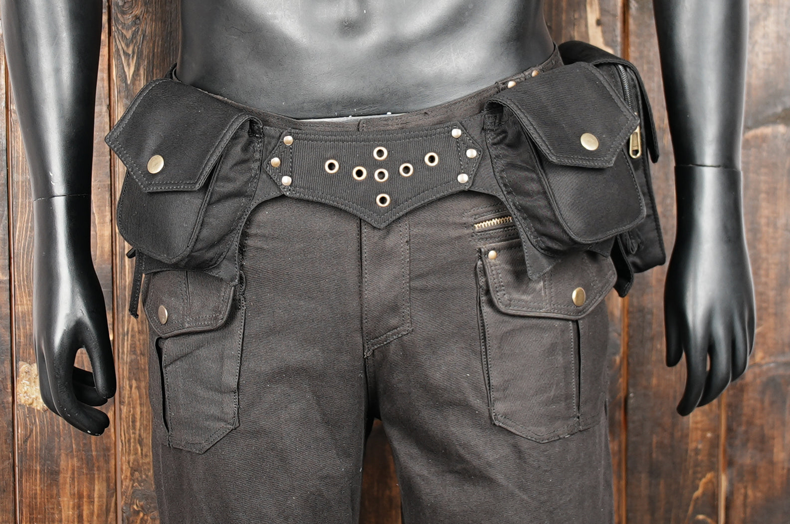 Black leather festival utility bag with multiple storage pockets