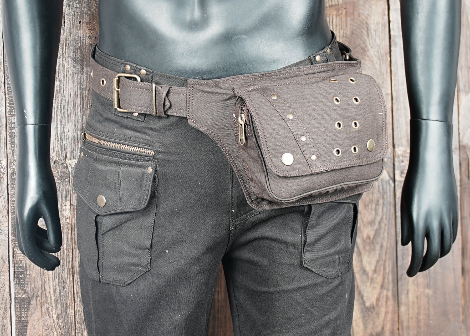 Brown utility hip bag with brass buttons and dual pockets