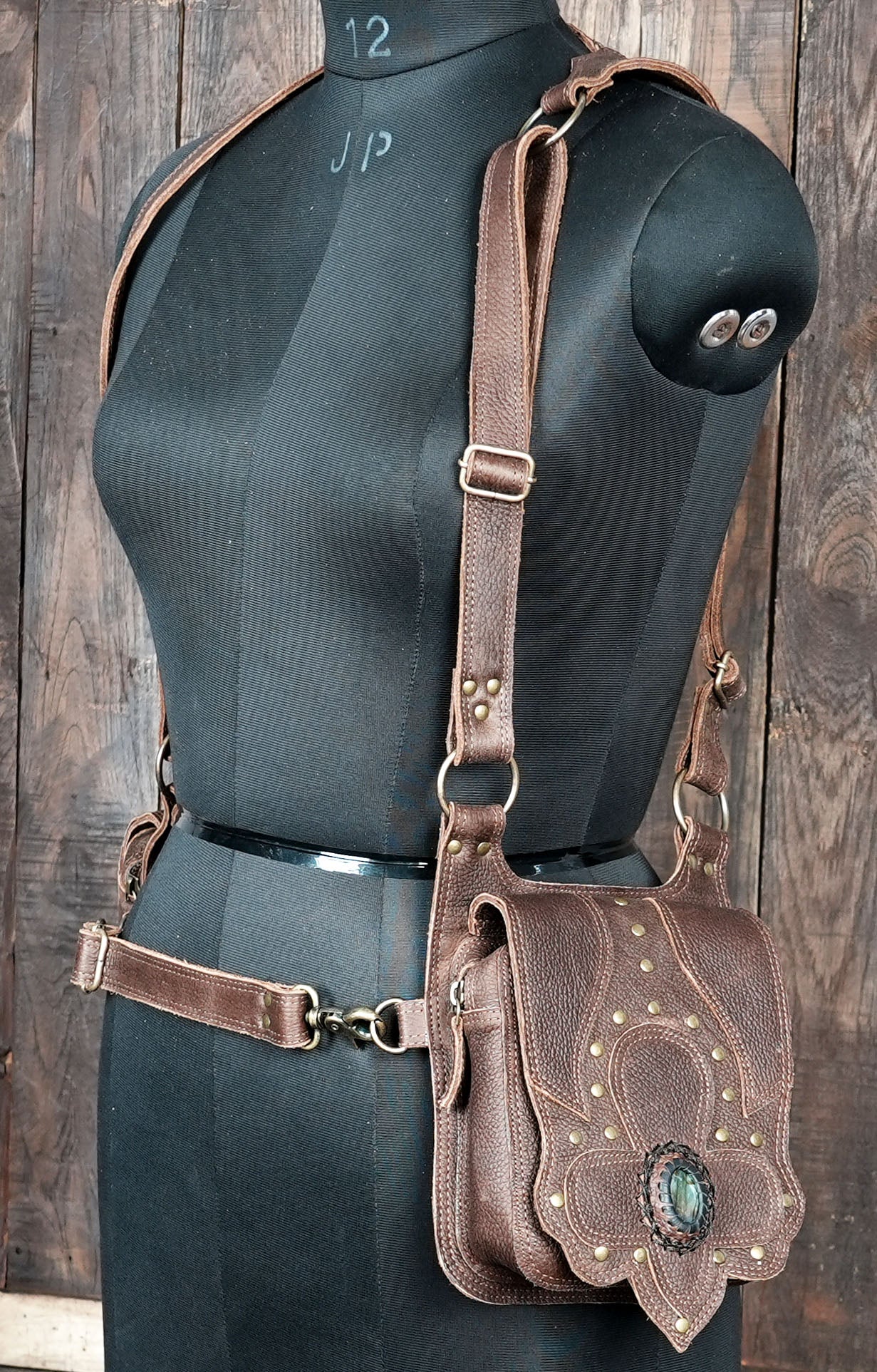 Artisan leather crossbody holster with metal studs