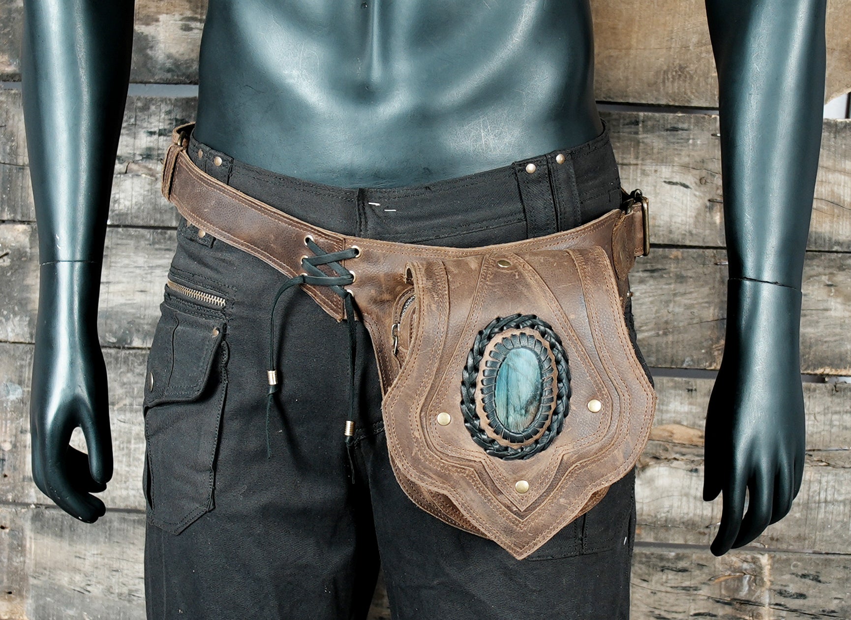 Steampunk-style leather waist pouch with gemstone centerpiece