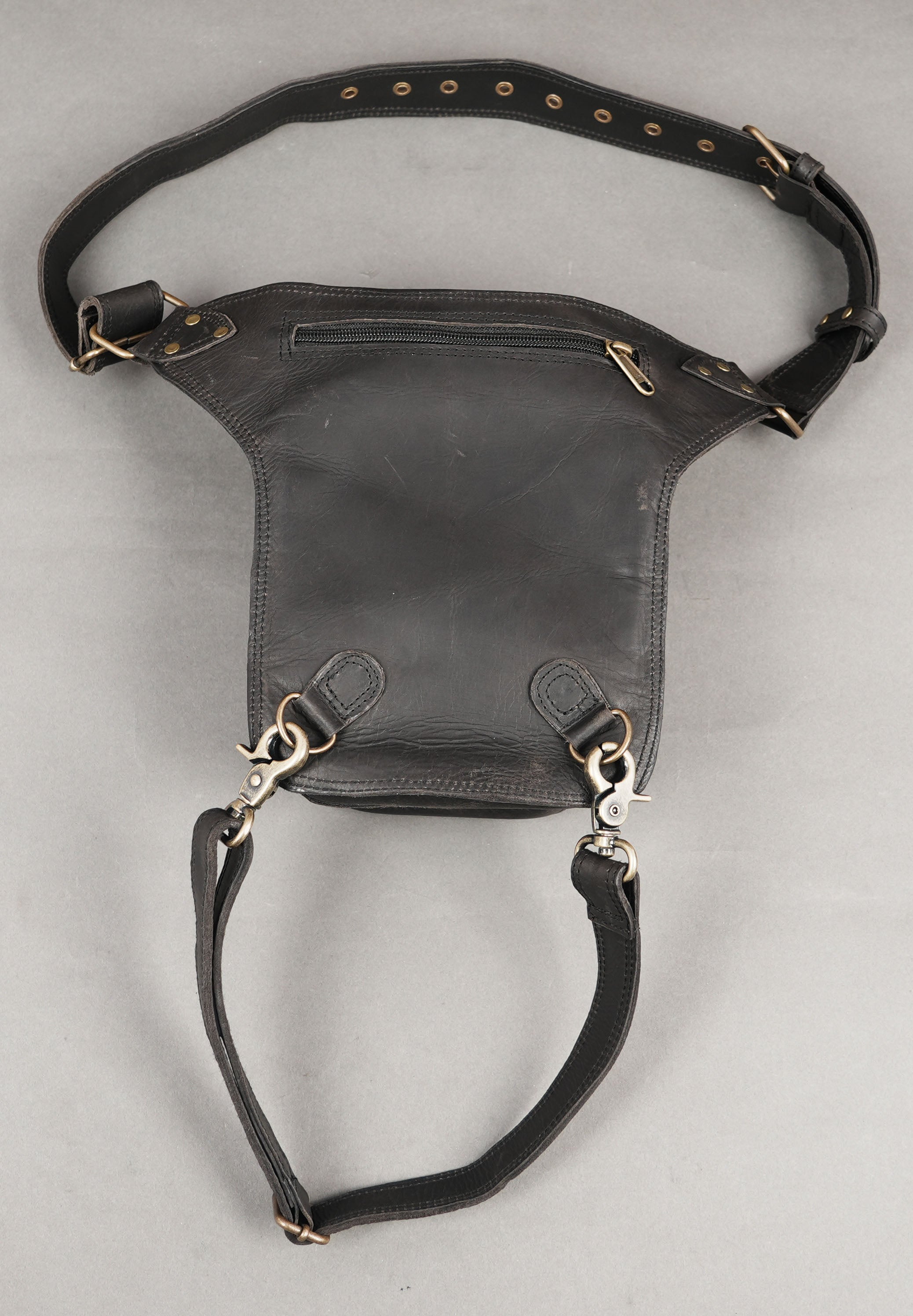 Gothic steampunk thigh pouch with brass studs and buckles