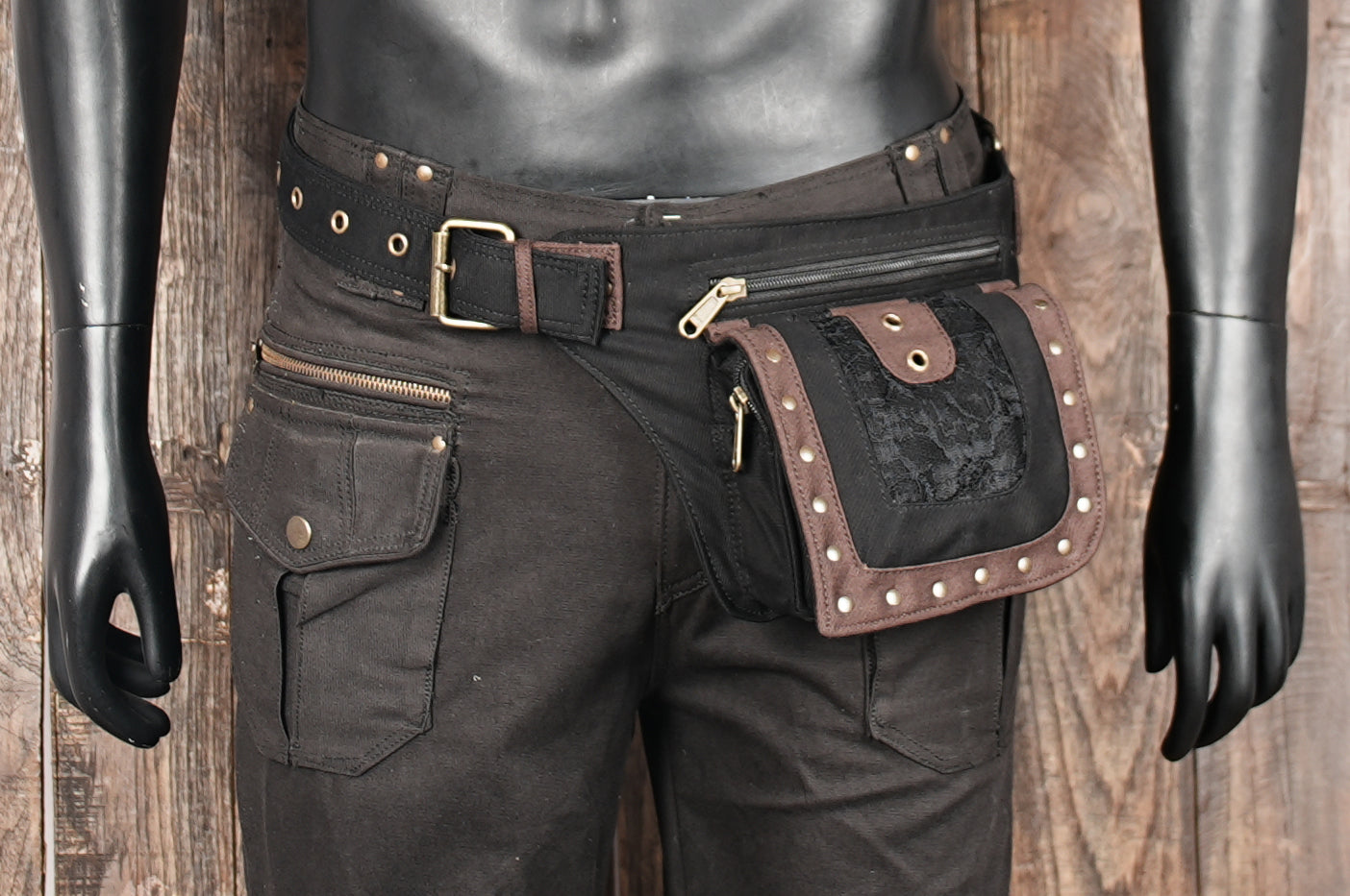 Canvas fanny pack with brass studs and front flap pocket