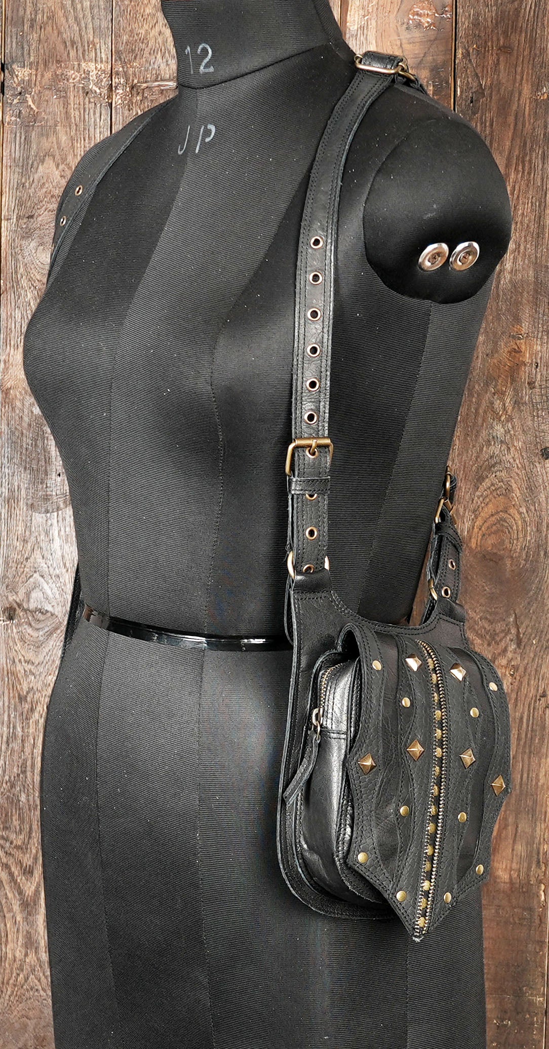 Rustic western leather harness bag with gemstone detailing
