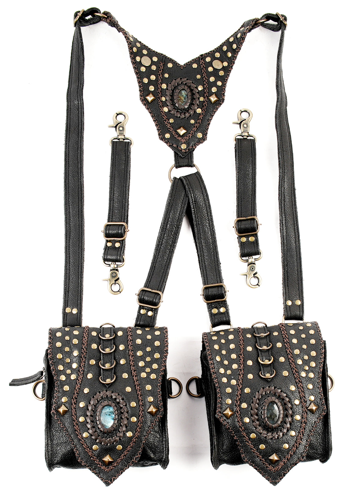 “Two-pocket black leather shoulder holster with brass hardware”