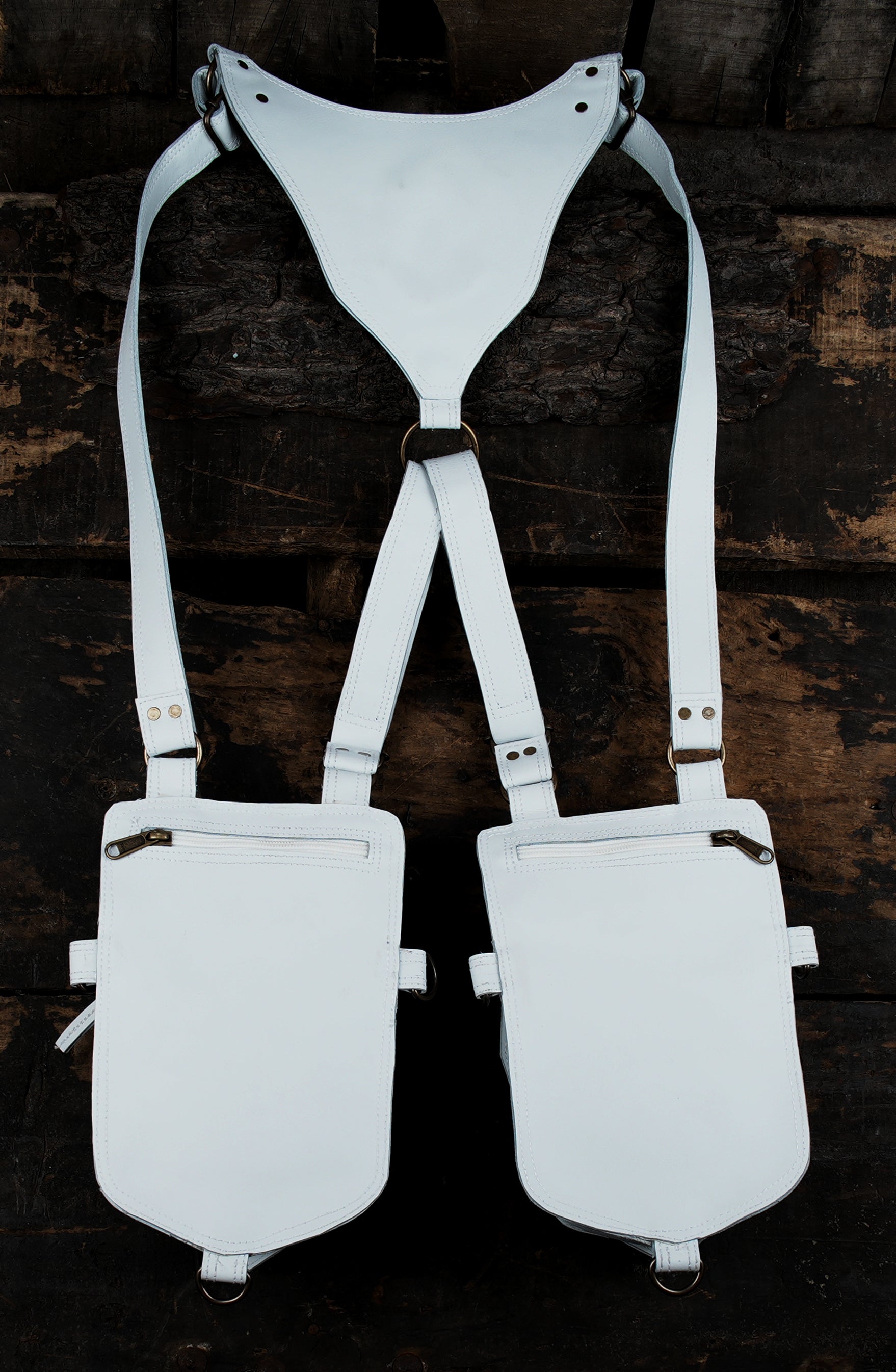 White leather shoulder holster with decorative gemstone
