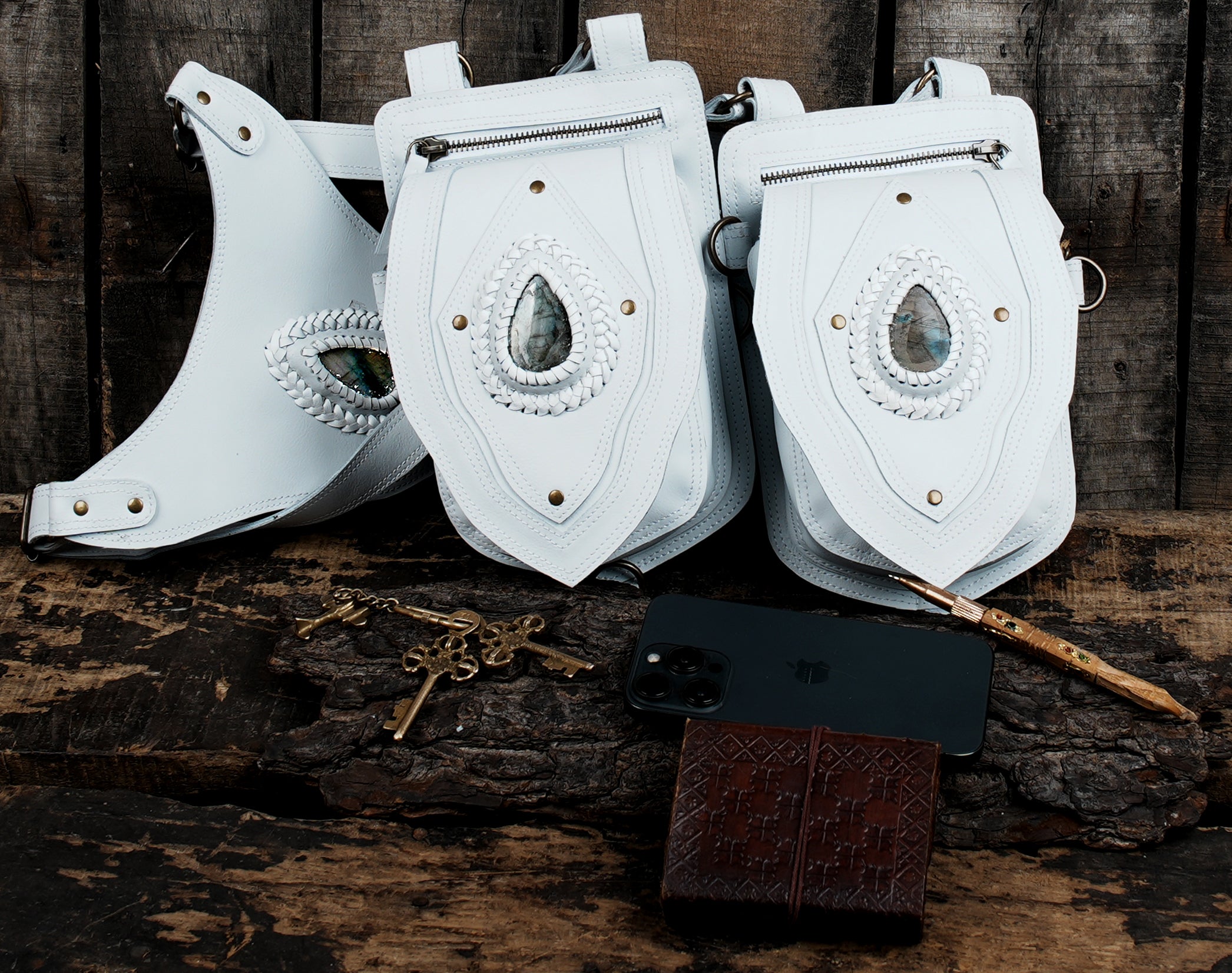 Tribal-inspired white leather holster with gemstone accents