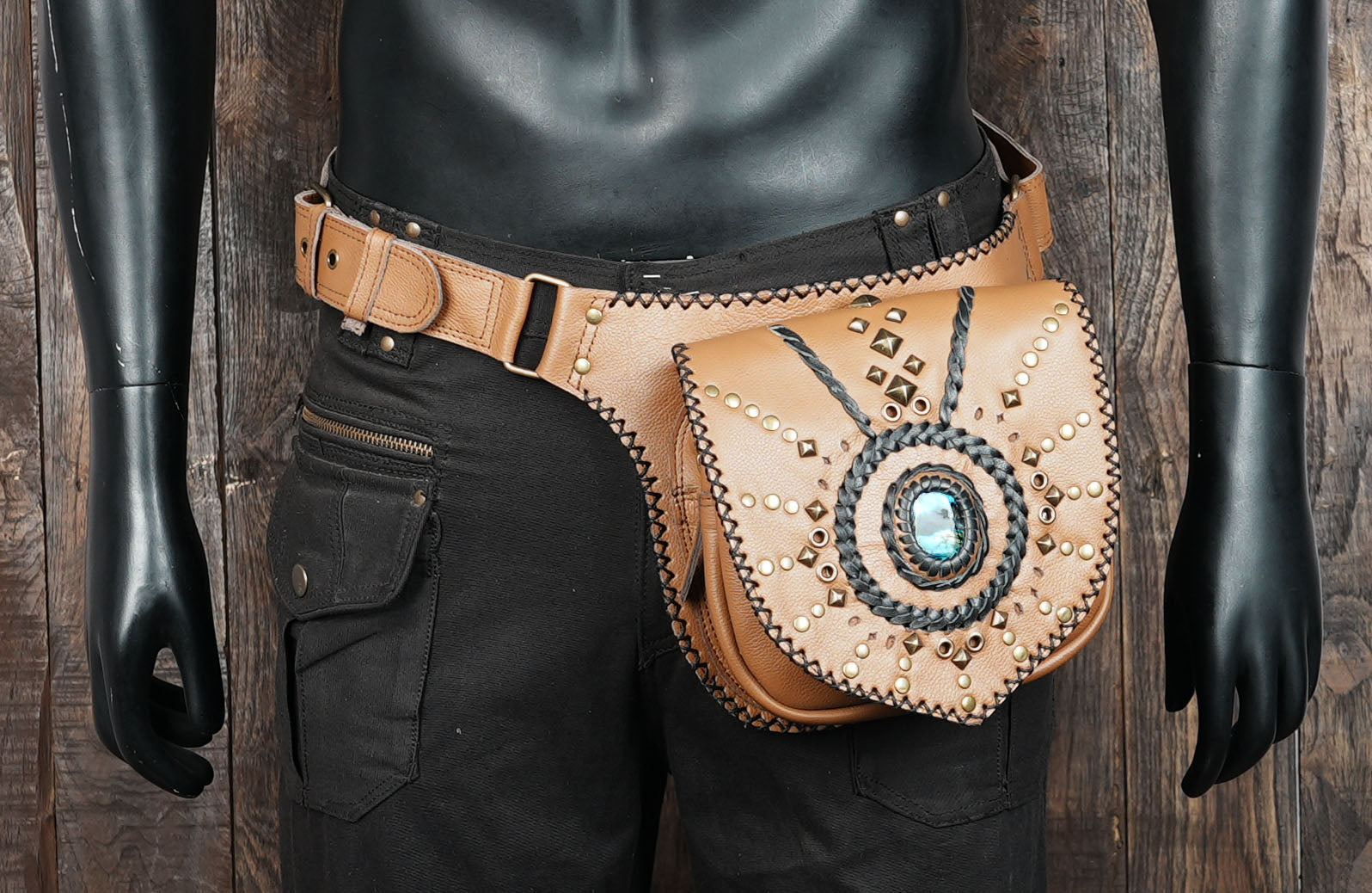 Adjustable tan leather belt bag with gemstone front design