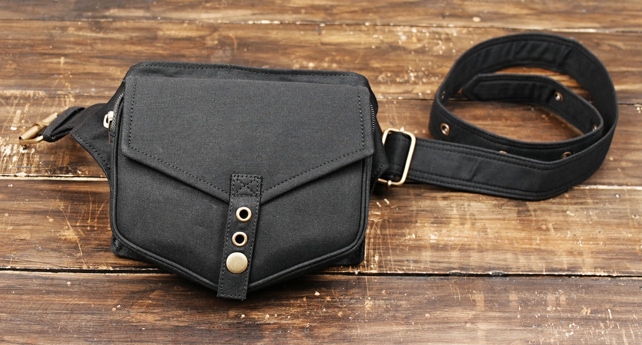 Unisex canvas fanny pack on mannequin waist