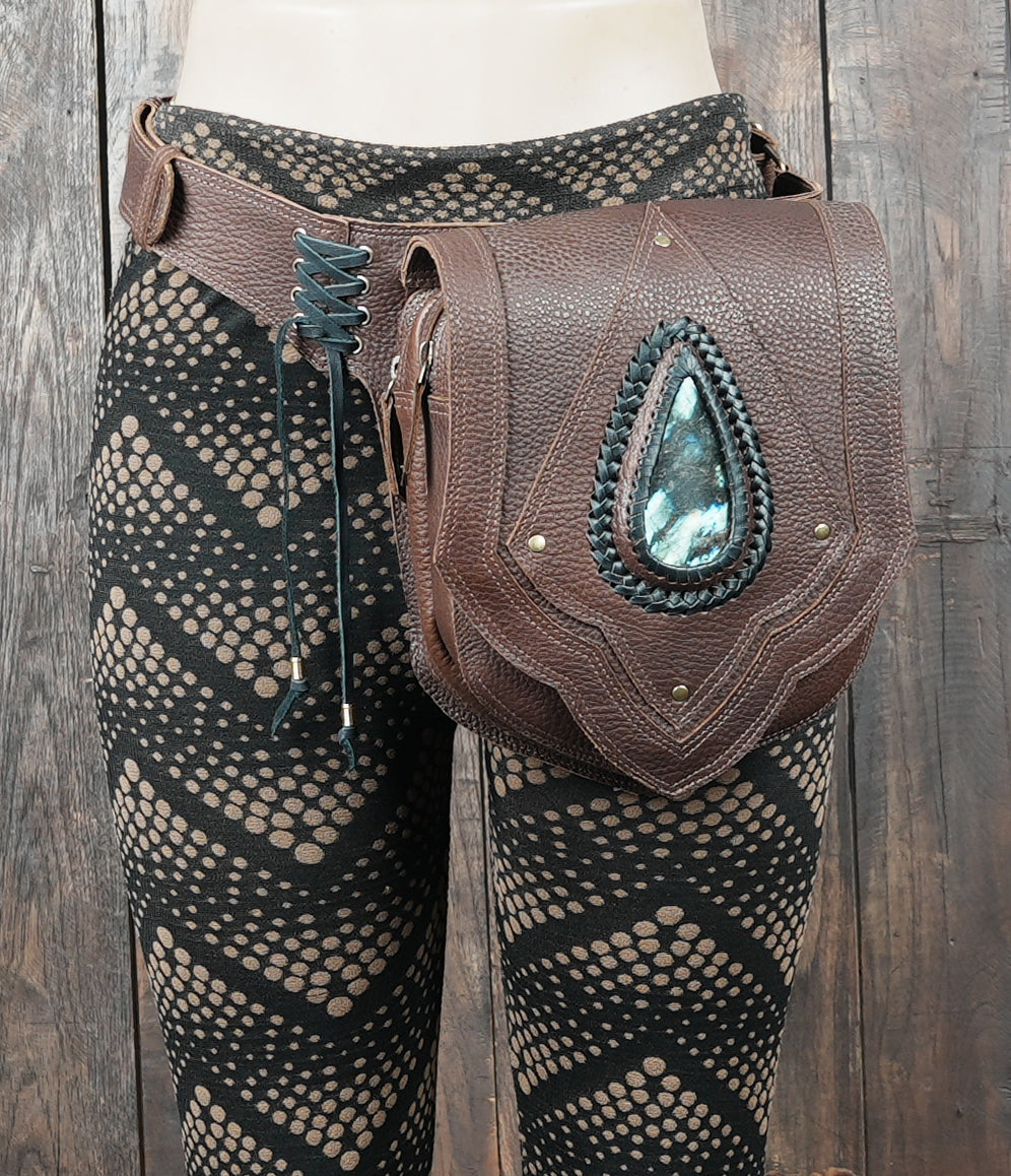 Adventure style waist utility pouch with textured leather and strong rivets