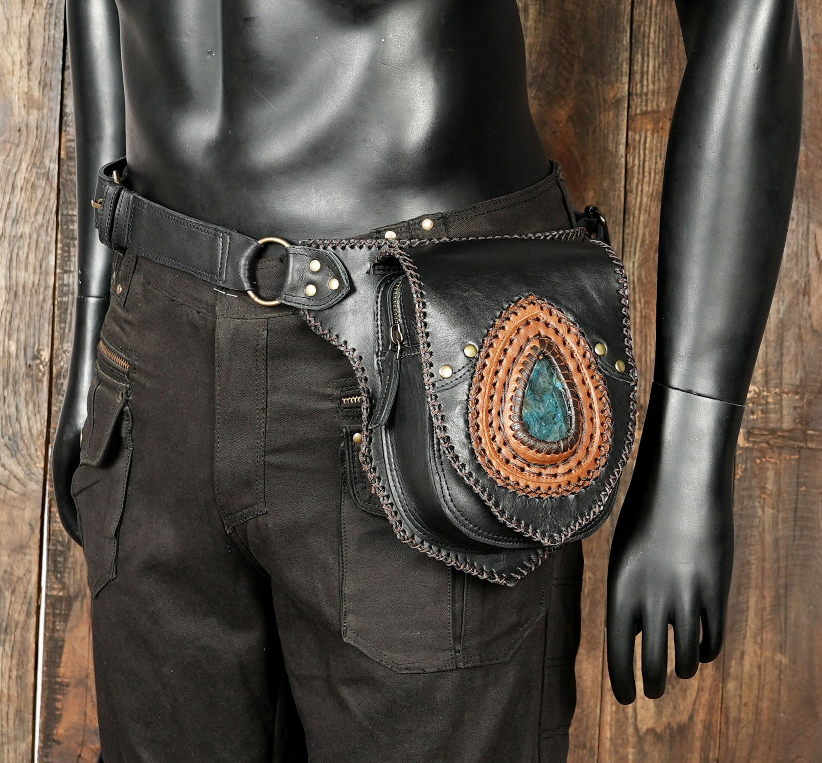 Adjustable leather belt with utility bag and gemstone