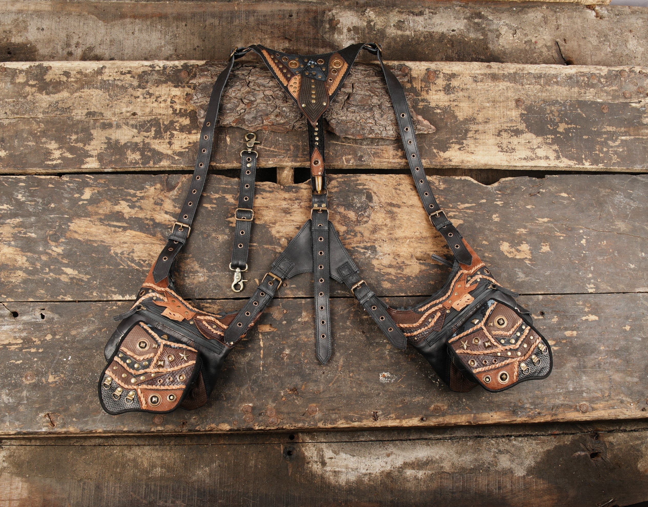 Handmade leather steampunk holster bag with dual utility pockets.