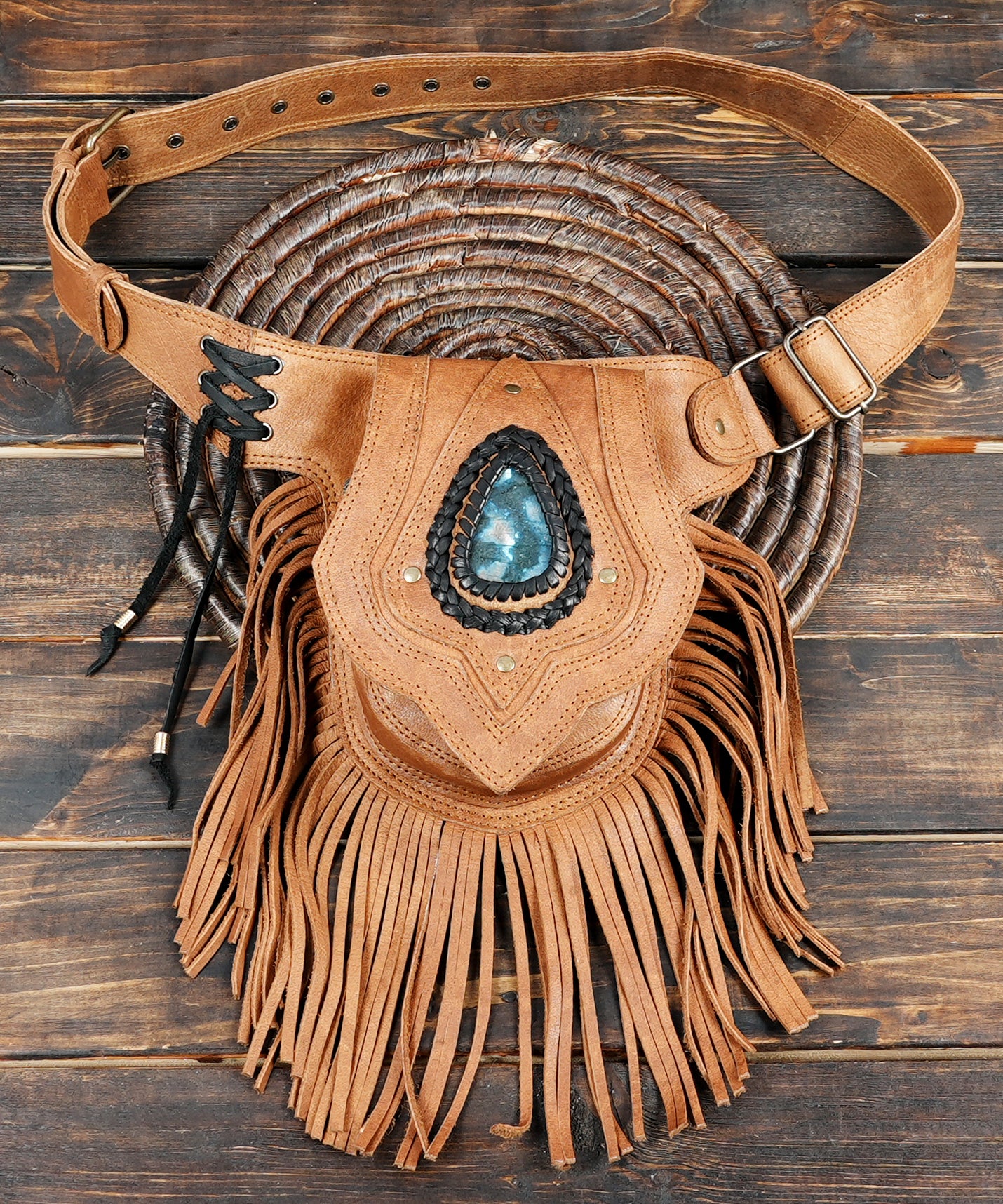 Festival-ready fringe leather waist bag with gemstone