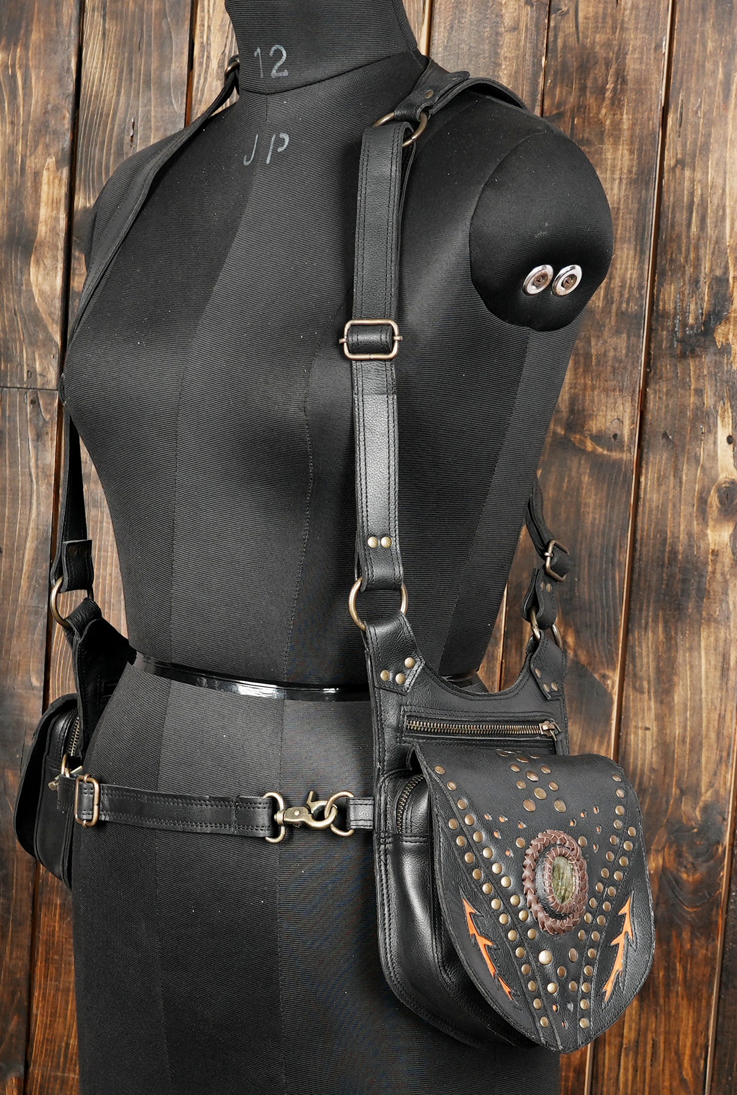 Durable leather shoulder holster with gemstone detail