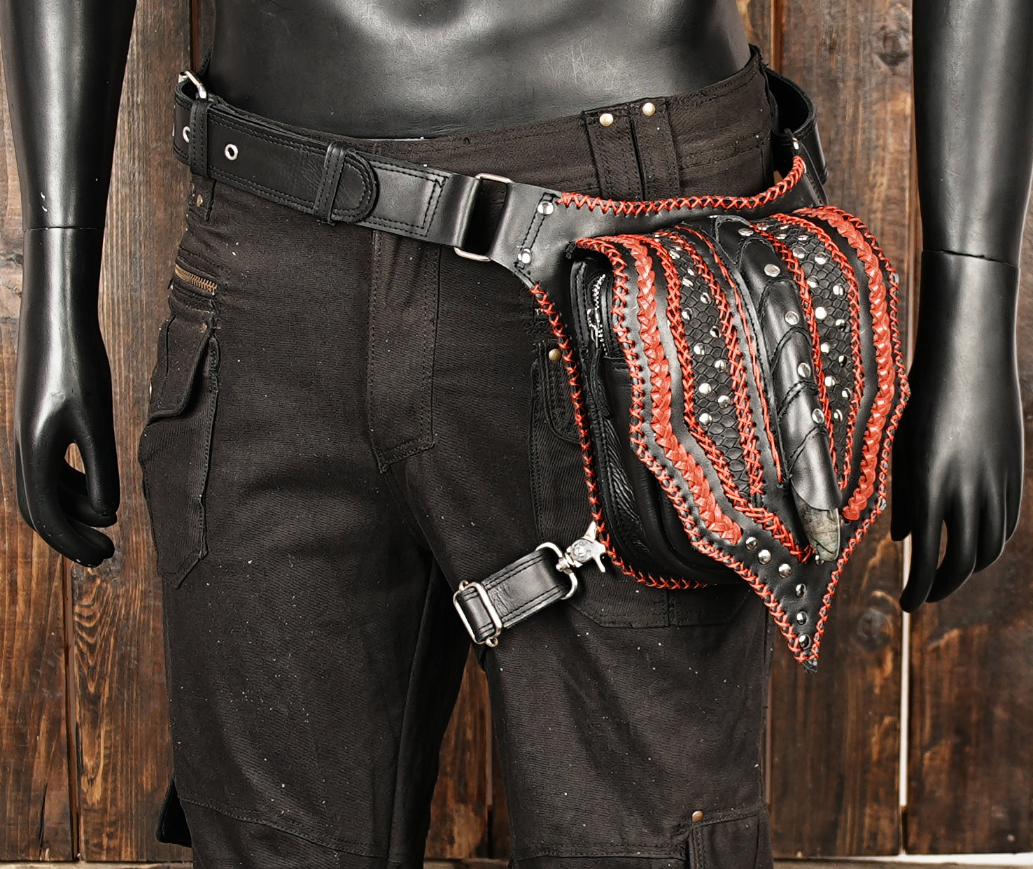 Bohemian black leather holster belt with handcrafted red lacing.
