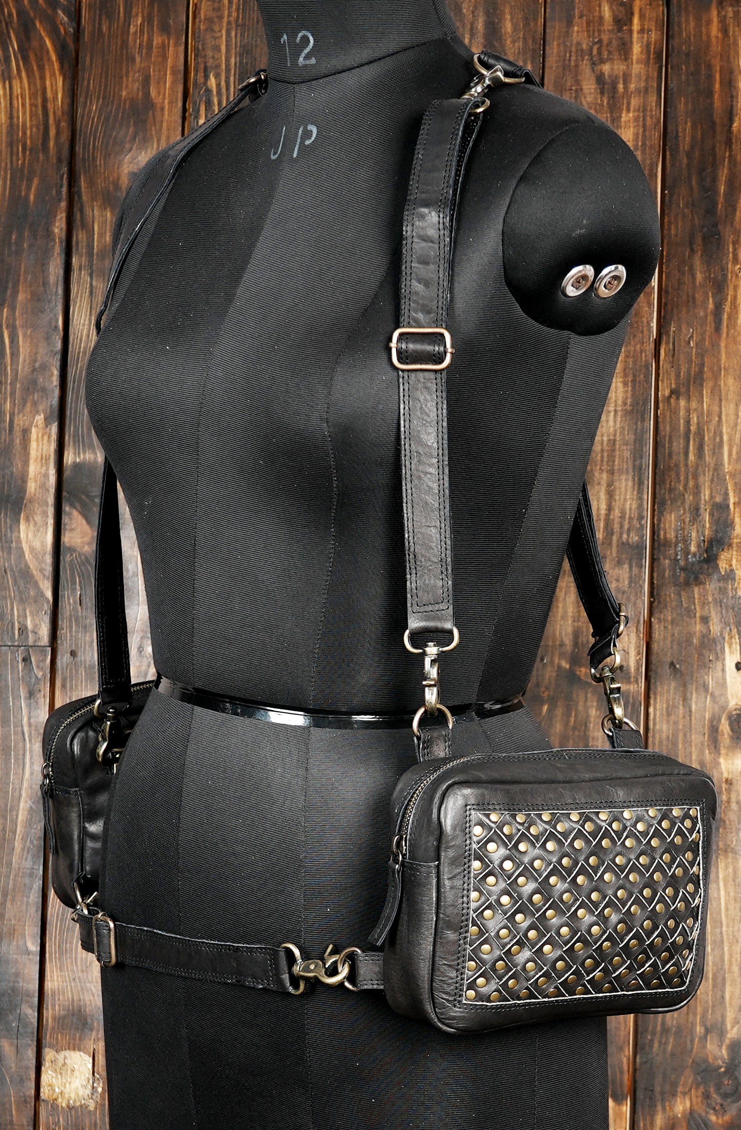 Fashionable leather shoulder harness with gemstone inlay