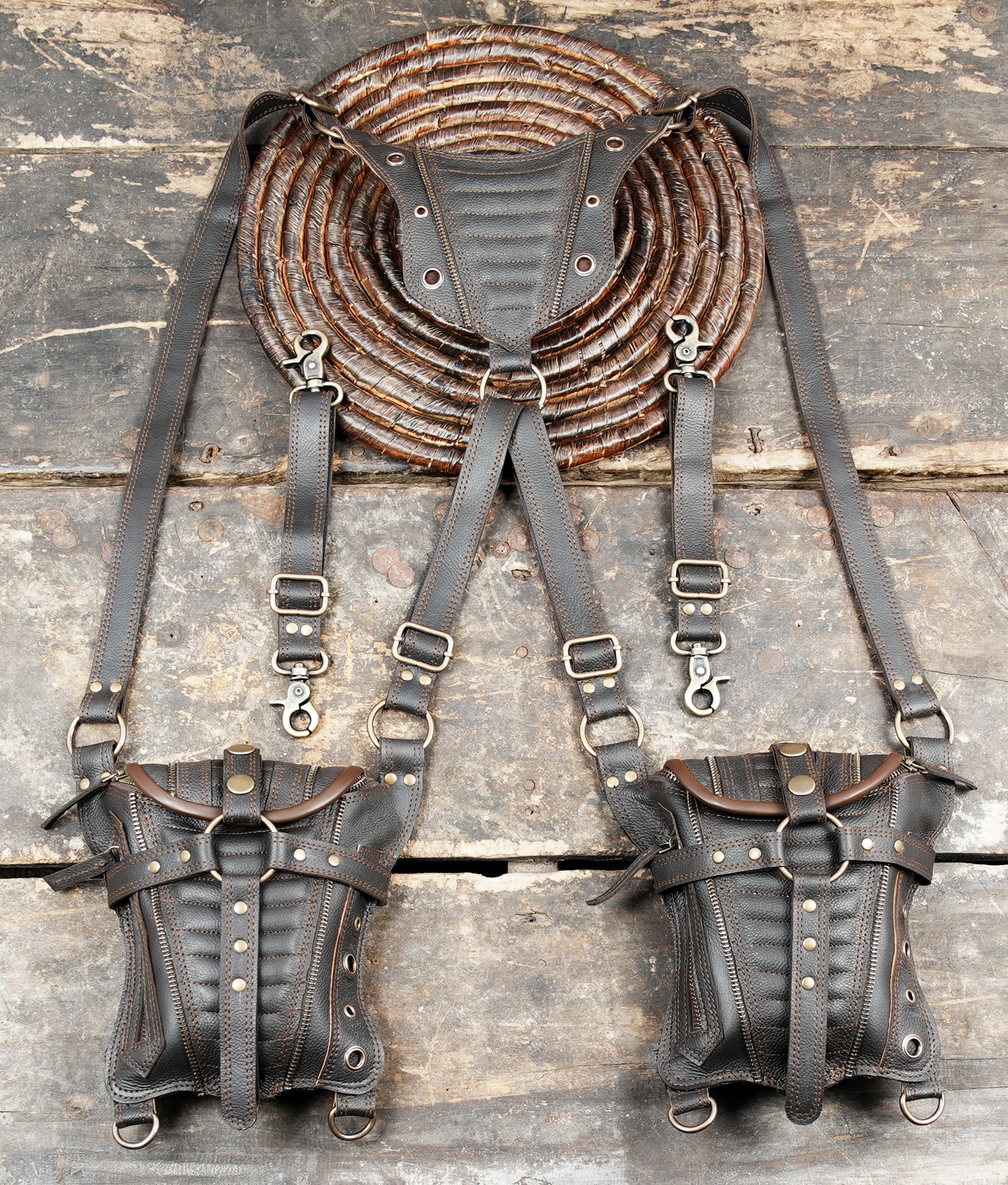 Festival-ready crossbody holster bag with unique panel design and brass details