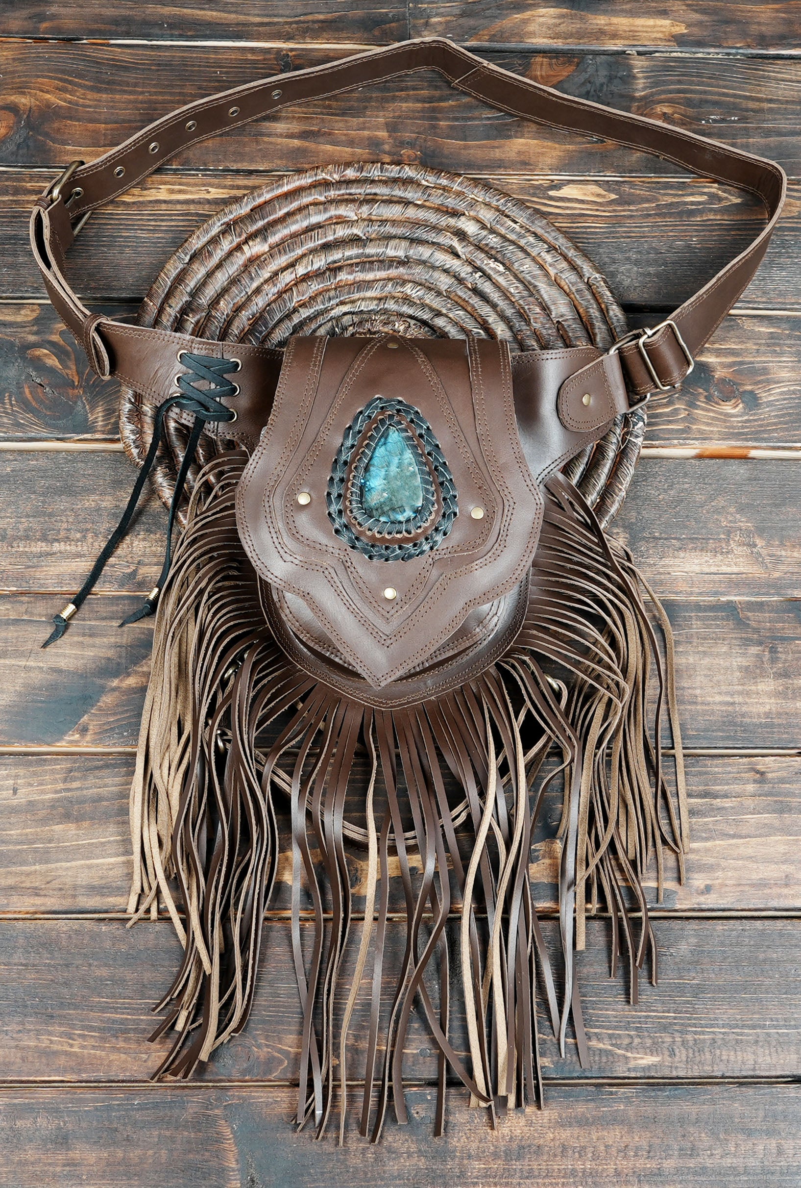 White leather waist bag with gemstone and decorative studs