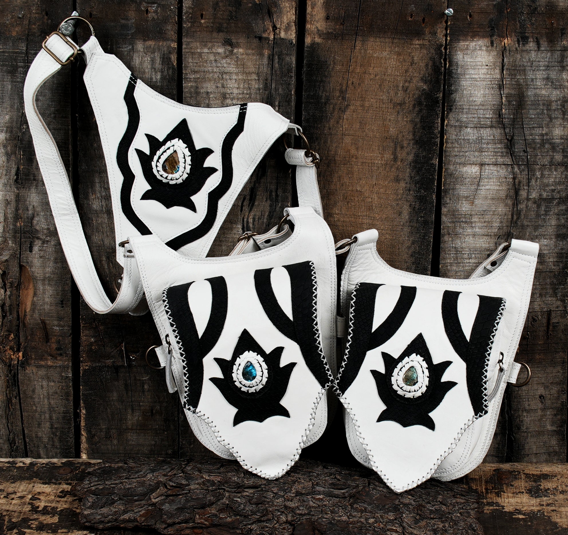 Western artisan holster bag featuring gemstone and vintage rivet design.