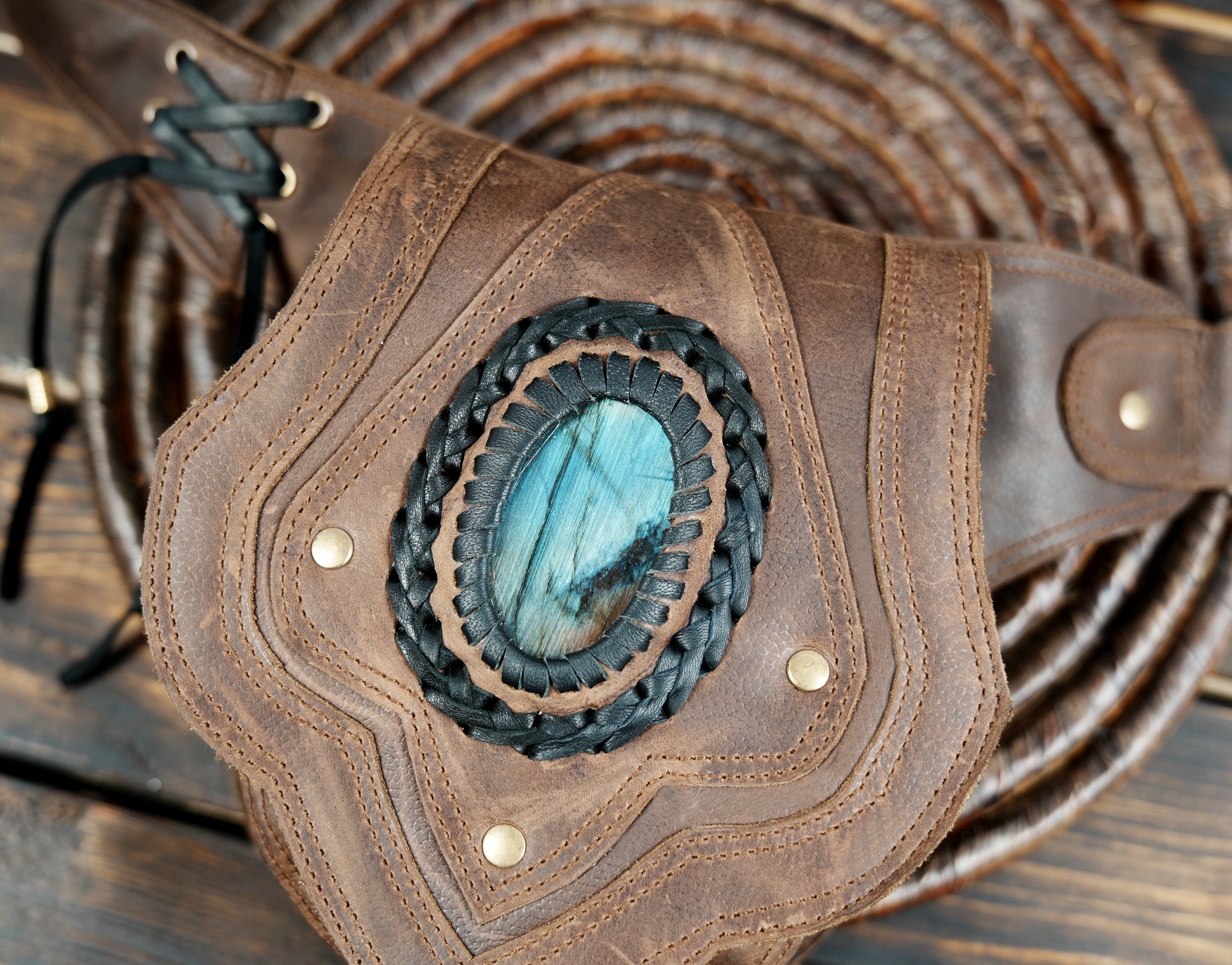 Vintage-style leather hip pouch with gemstone centerpiece