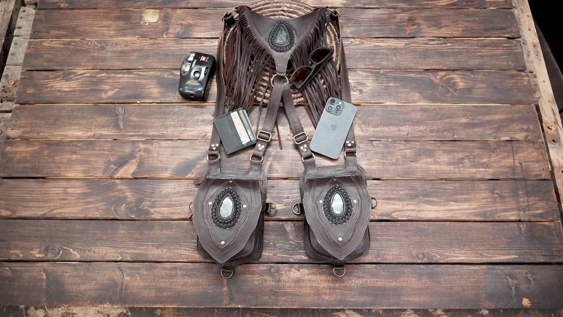 Artisan leather holster bag with gemstone detail and fringe