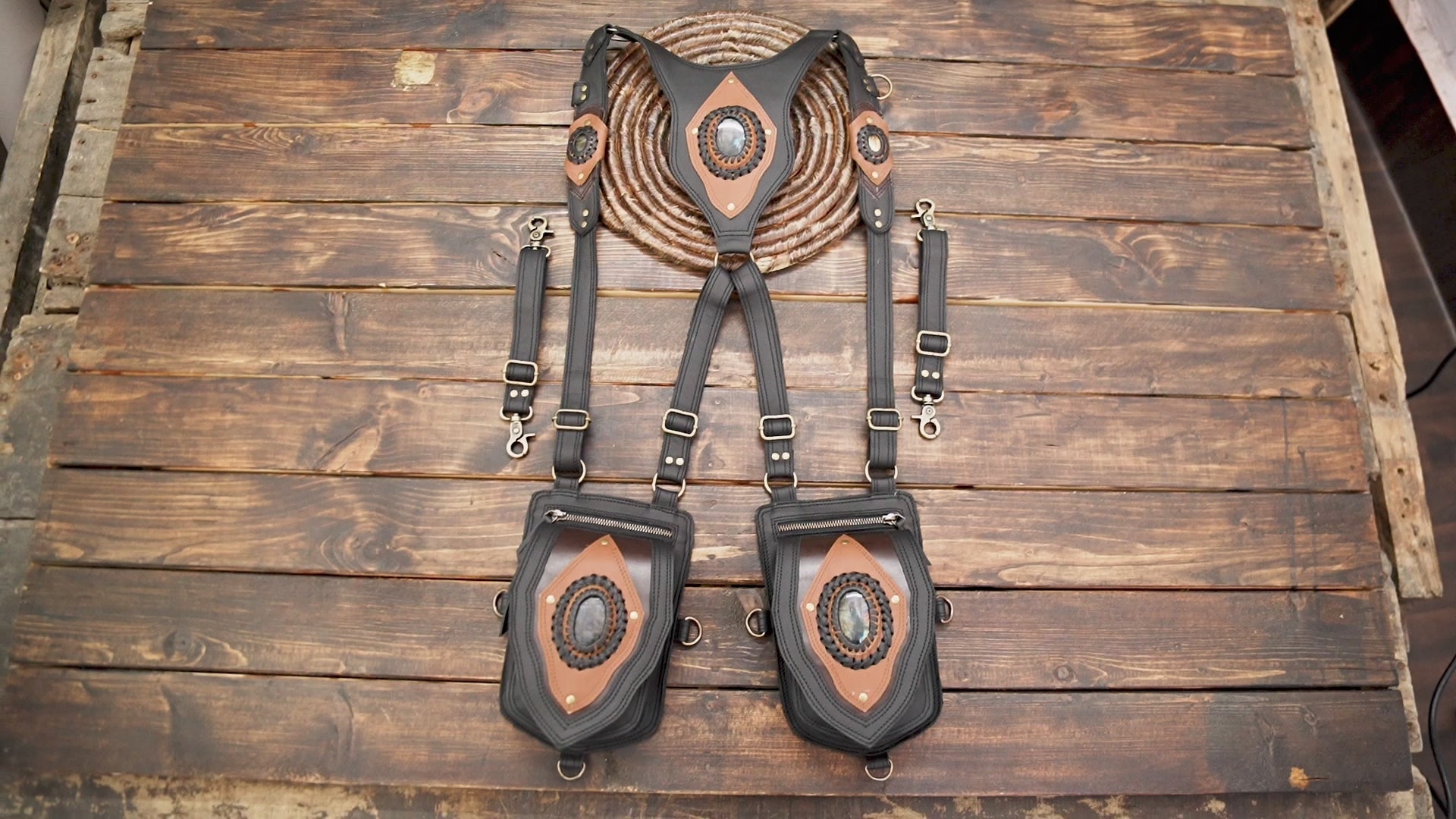 artisan leather shoulder holster bag with oval stone and contrast panels