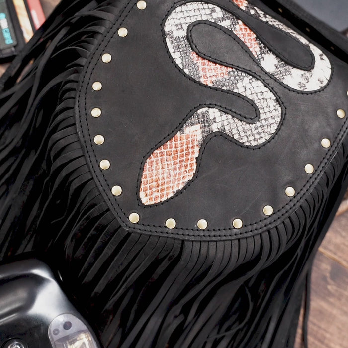 Festival-ready fringe belt bag with reptile-inspired details