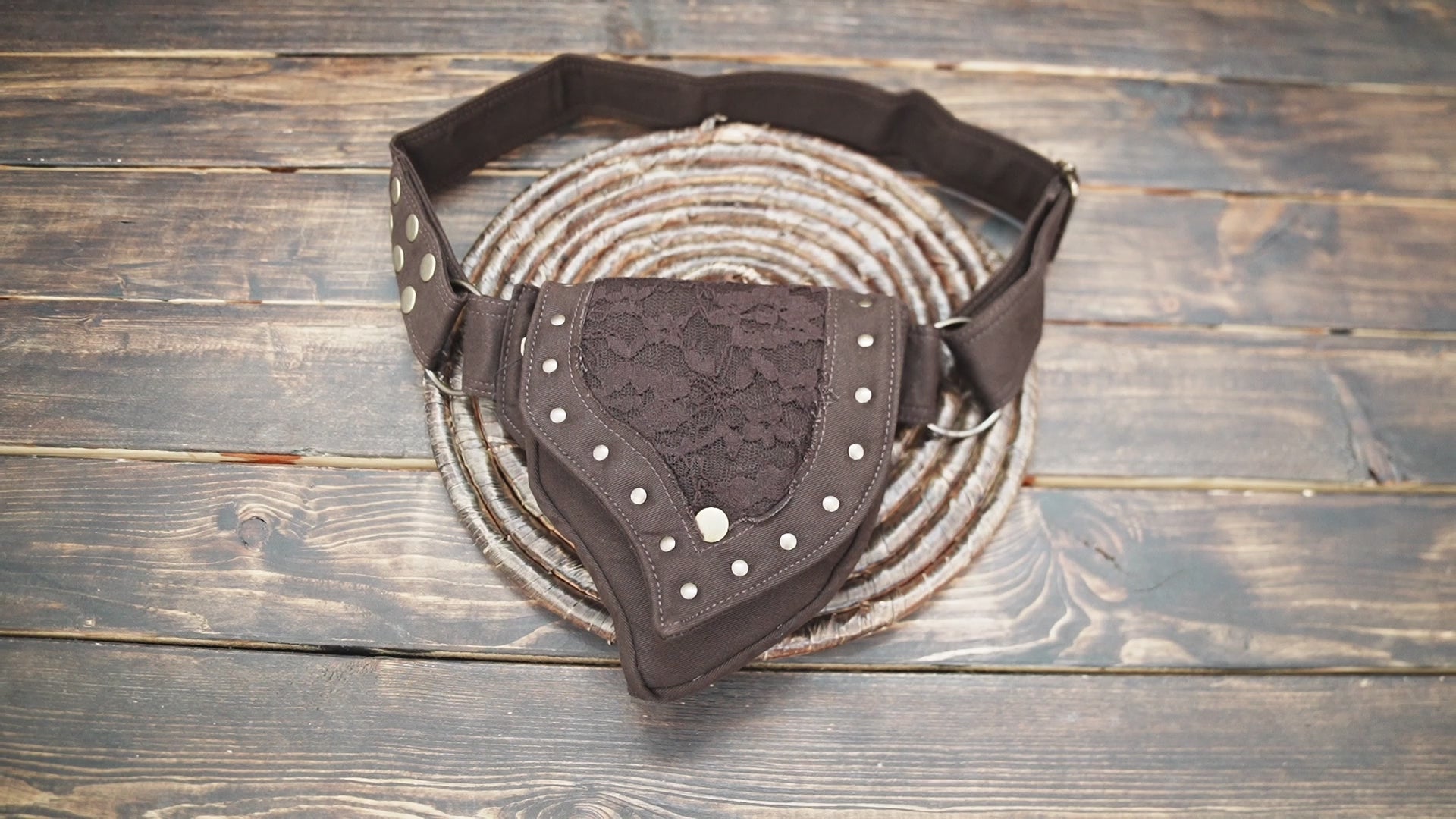 Steampunk-style brown lace waist bag with metal studs