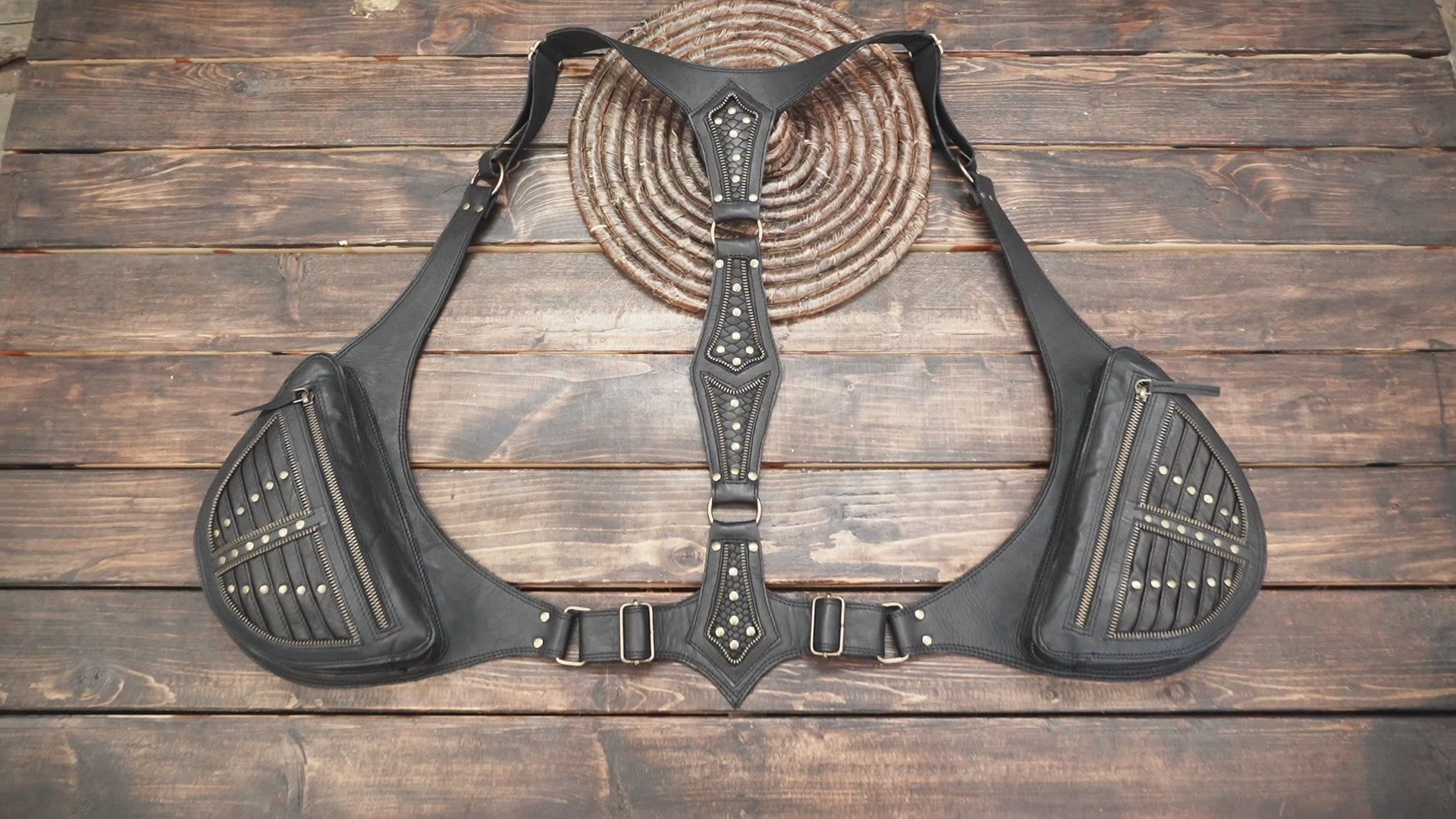 Handmade leather holster harness with metal studs and zipper pockets