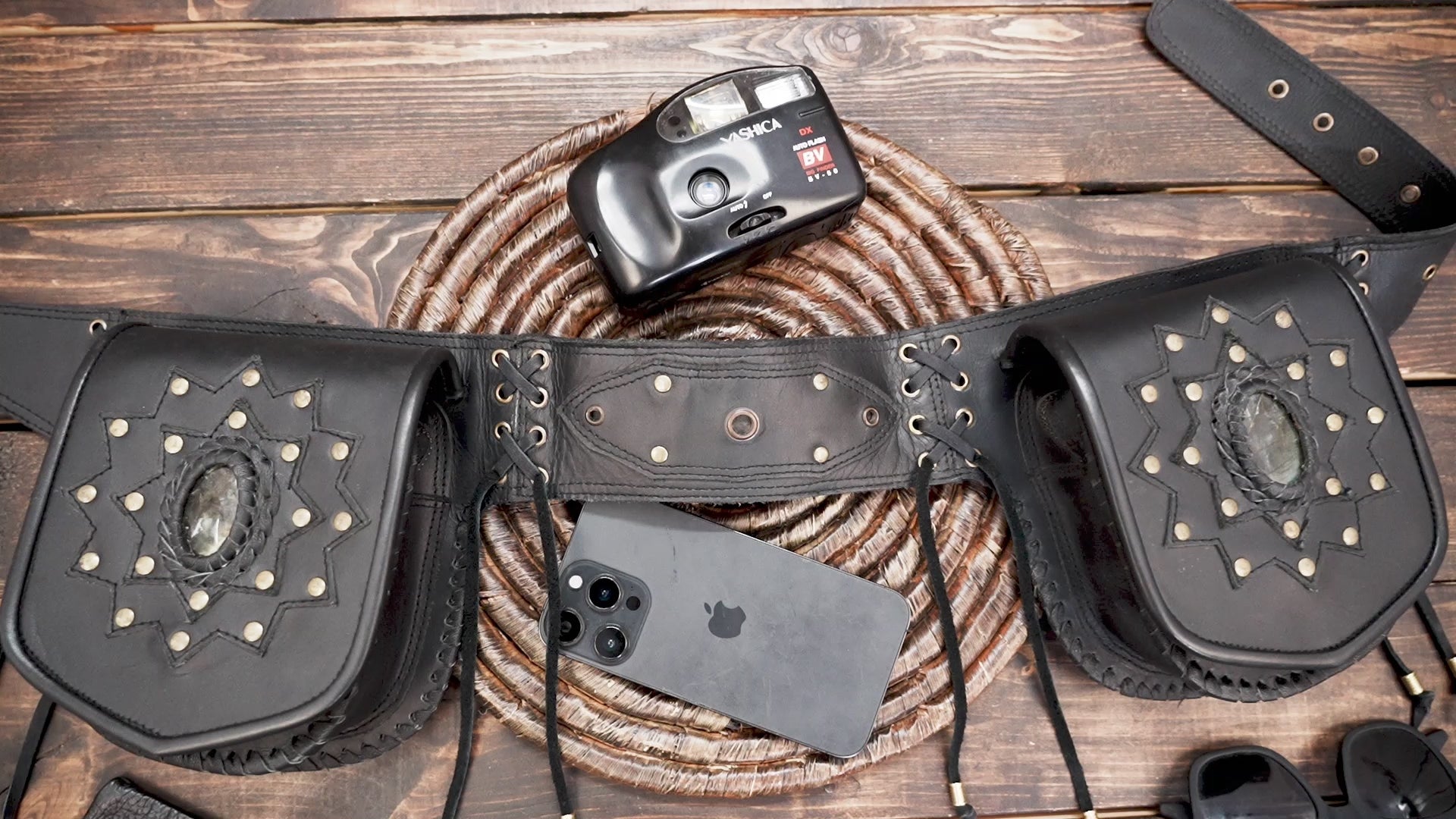 Festival style leather belt bag with dual pouches and stone inlay