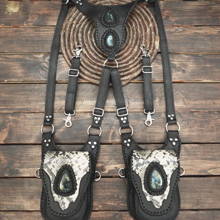 Fantasy style black leather harness holster with gemstone accents