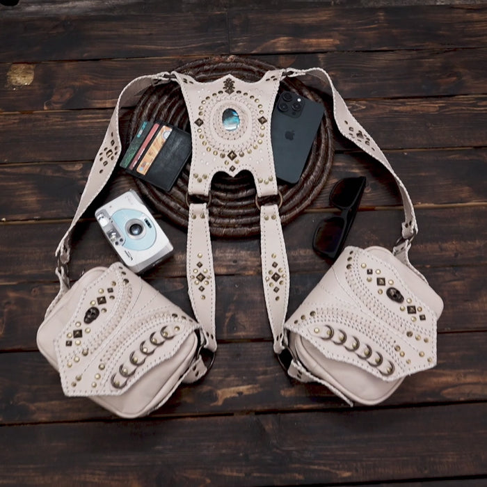 Close-up of handcrafted leather holster bag with brass studs