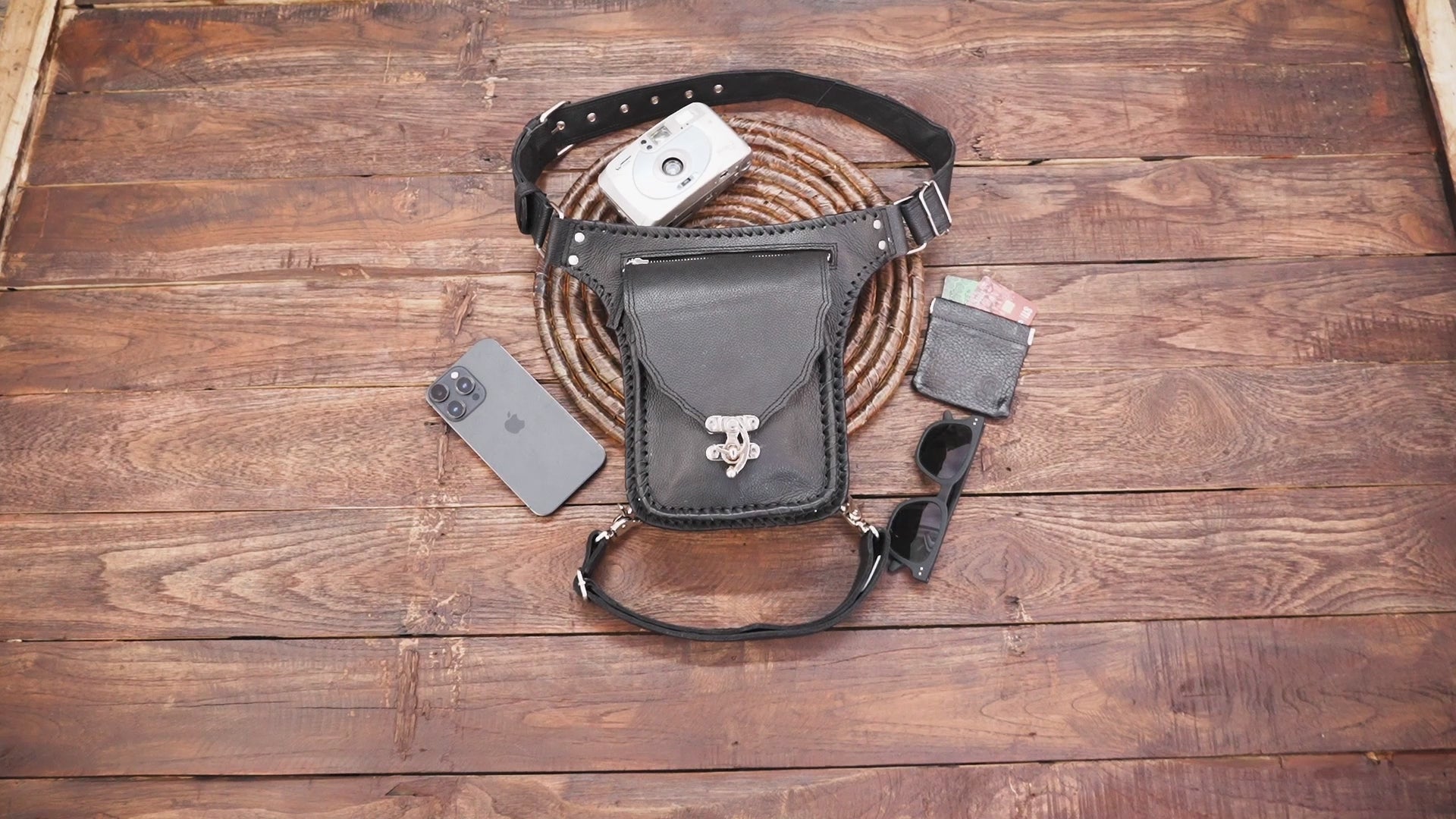 Western-style black belt pouch with metal buckle and leather strap with steel lock 