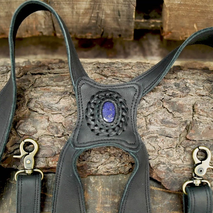 close-up of blue gemstone in leather holster bag