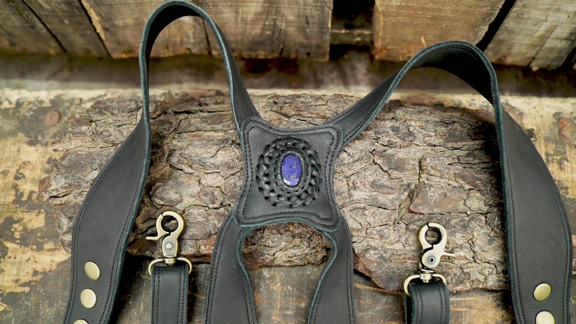 close-up of blue gemstone in leather holster bag