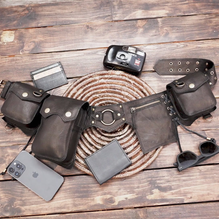 Black leather hip bag for men and women with brass details