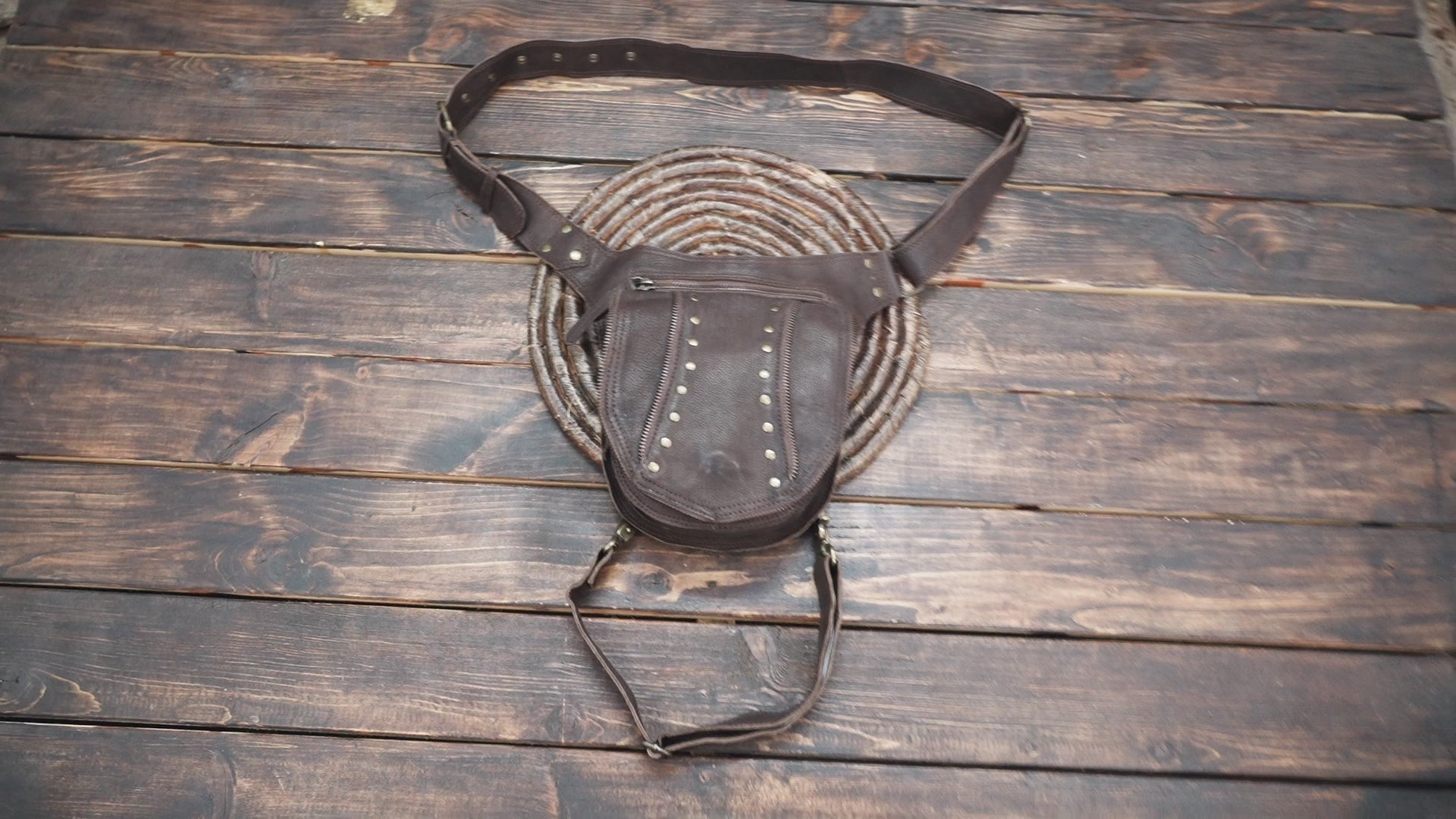 Handmade leather hip bag with adjustable waist and leg straps