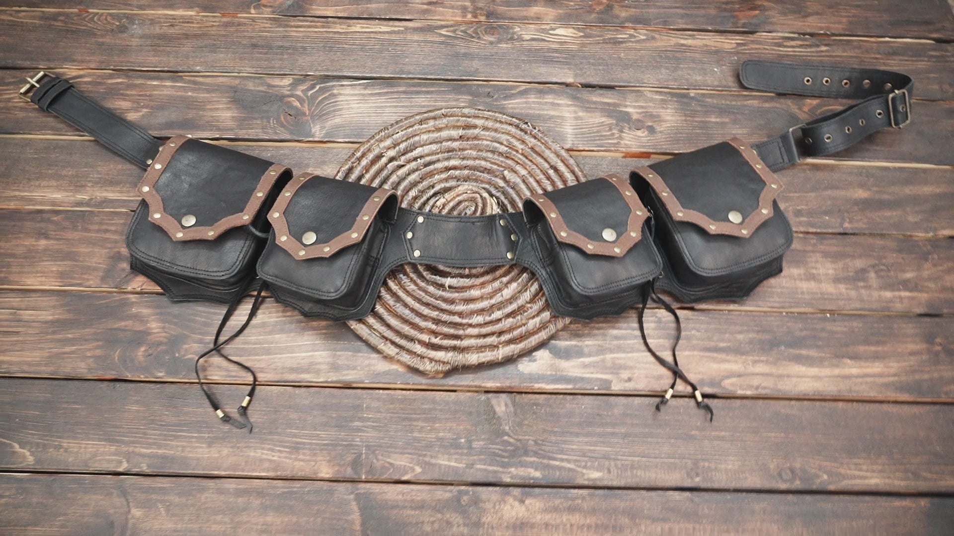 Crafted from high-quality genuine leather, it features four spacious pouches,