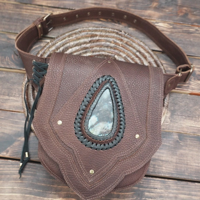 Adventure style waist utility pouch with textured leather and strong rivets