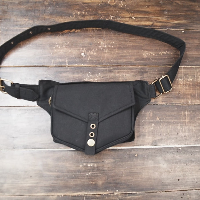 Minimalist black fanny pack with adjustable strap